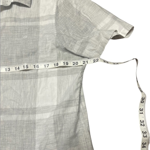 Calvin Klein button down shirt.      B2 - Picture 8 of 8